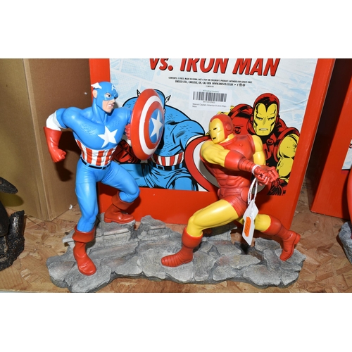 611 - A BOXED ENESCO MARVEL 'CAPTAIN AMERICA VS IRON MAN' FIGURE GROUP, depicting the two superheroes in a... 