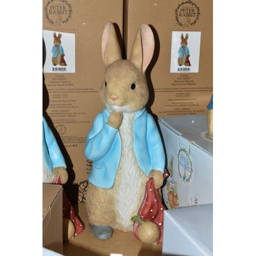 613 - A GROUP OF BOXED ENESCO BEATRIX POTTER PETER RABBIT COLLECTABLES, comprising a limited edition Peter... 