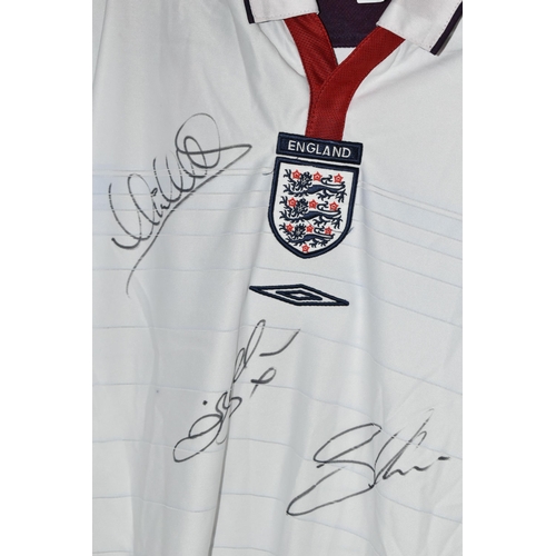 631 - A SIGNED REPLICA ENGLAND MEN'S FOOTBALL SHIRT, signatures of David Beckham, Michael Owen and Sven Go... 