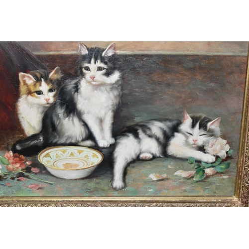 644 - GRAHAM METSU (1932-) A STUDY OF THREE KITTENS, three kittens are beside a copper vase with roses sca... 