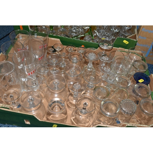 680 - TEN BOXES OF DRINKING GLASSES, a large quantity, to include sets of clear pub glasses, sherry schoon... 