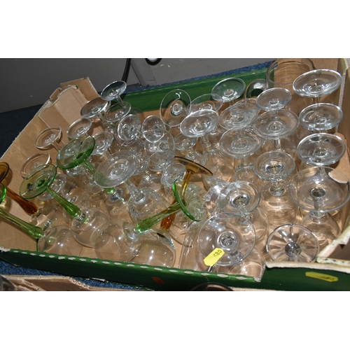 680 - TEN BOXES OF DRINKING GLASSES, a large quantity, to include sets of clear pub glasses, sherry schoon... 