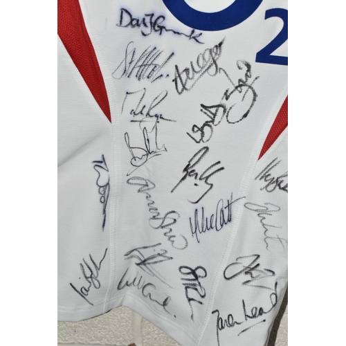 722 - A SIGNED REPLICA ENGLAND MEN'S RUGBY WORLD CUP 2003 SHIRT, multiple signatures in black felt pen to ... 