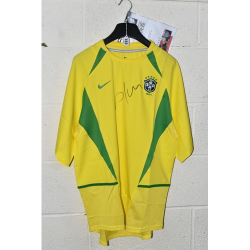 723 - A BRAZIL REPLICA HOME FOOTBALL SHIRT SIGNED BY CAFU, signed to front in black felt pen, shirt in ver... 