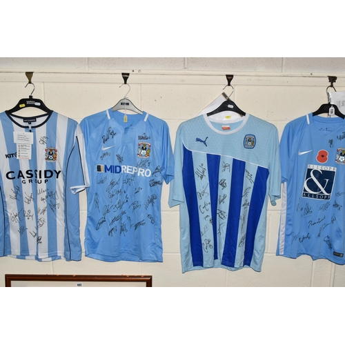 728 - FOUR SIGNED COVENTRY CITY REPLICA HOME FOOTBALL SHIRTS, all date from the 21st Century and are signe... 