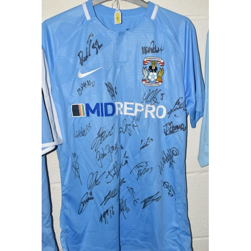 728 - FOUR SIGNED COVENTRY CITY REPLICA HOME FOOTBALL SHIRTS, all date from the 21st Century and are signe... 