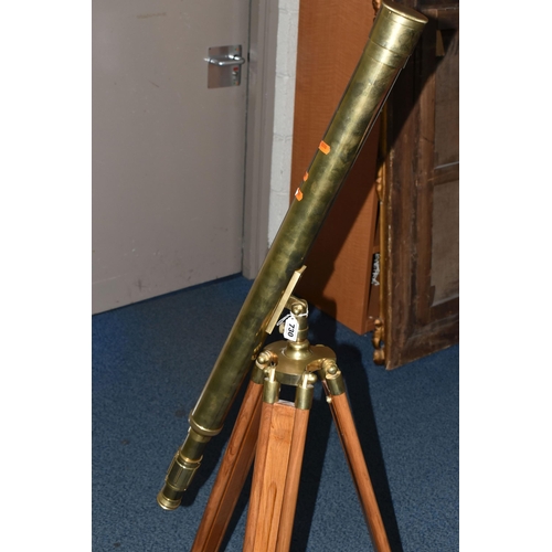 730 - A BRASS NAUTICALIA TELESCOPE WITH WOOD AND BRASS TRIPOD, approximate minimum length 95cm, 45mm objec... 