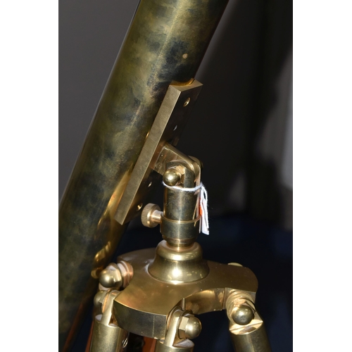 730 - A BRASS NAUTICALIA TELESCOPE WITH WOOD AND BRASS TRIPOD, approximate minimum length 95cm, 45mm objec... 