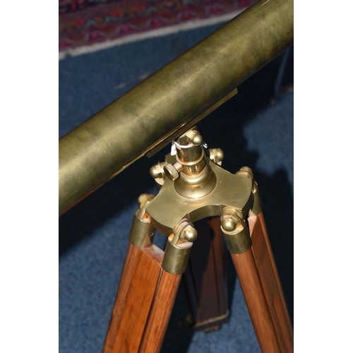 730 - A BRASS NAUTICALIA TELESCOPE WITH WOOD AND BRASS TRIPOD, approximate minimum length 95cm, 45mm objec... 