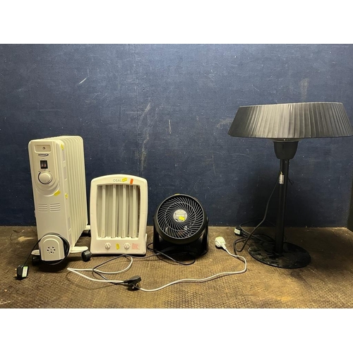 1056 - A ZENNOX OIL FILLED RADIATOR, a Honeywell fan, a Osalis Tanning lamp and a Studio table top patio he... 