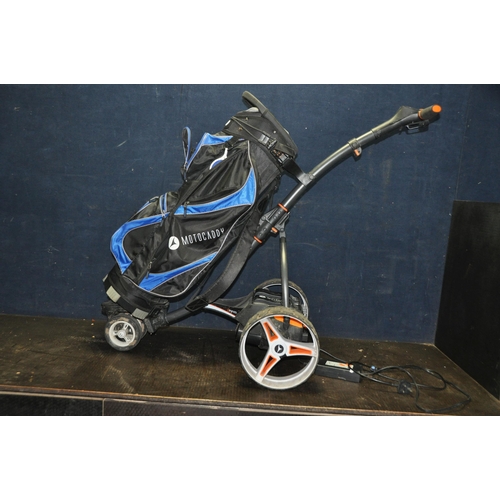 1064 - A MOTOCADDY S7REMOTE ELECTRIC GOLF TROLLEY AND BAG with one battery and charger (PAT pass and workin... 