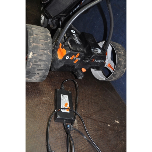 1064 - A MOTOCADDY S7REMOTE ELECTRIC GOLF TROLLEY AND BAG with one battery and charger (PAT pass and workin... 