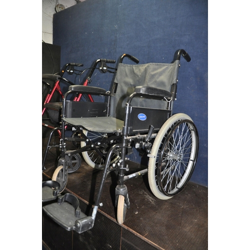 1065 - AN INVACARE DUO HD FOLDING WHEELCHAIR with two footrests and a Days travelator (2)