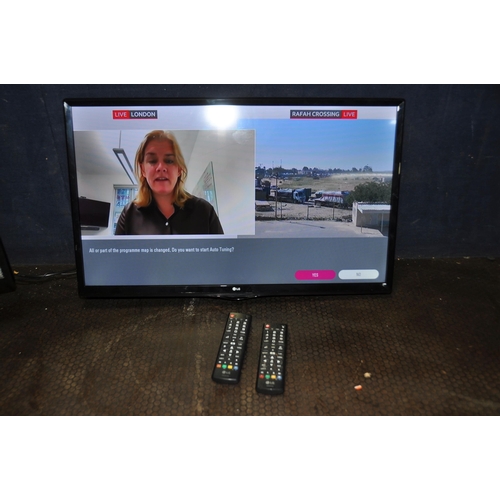 1074 - A LG 28MT49DF 28in TV with remote and wall bracket (no stand) a LG 24MT48DF 24in TV with remote and ... 