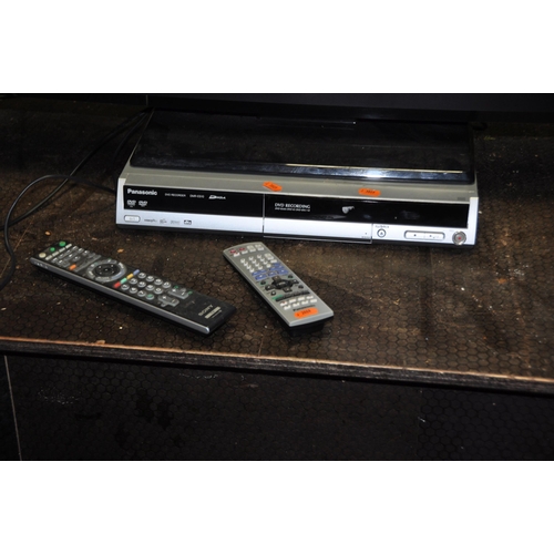 1085 - A SONY KDL32S5500 32in TV with remote, a Panasonic DVD player with remote (doesn't power up) and a B... 