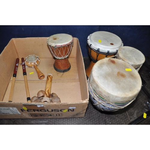 1110 - A COLLECTION OF PERCUSSION INSTRUMENTS including a pair of congos with stand, a pair of Diamond UK b... 