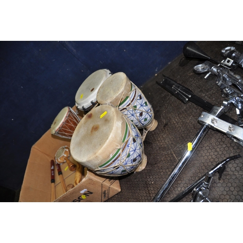 1110 - A COLLECTION OF PERCUSSION INSTRUMENTS including a pair of congos with stand, a pair of Diamond UK b... 