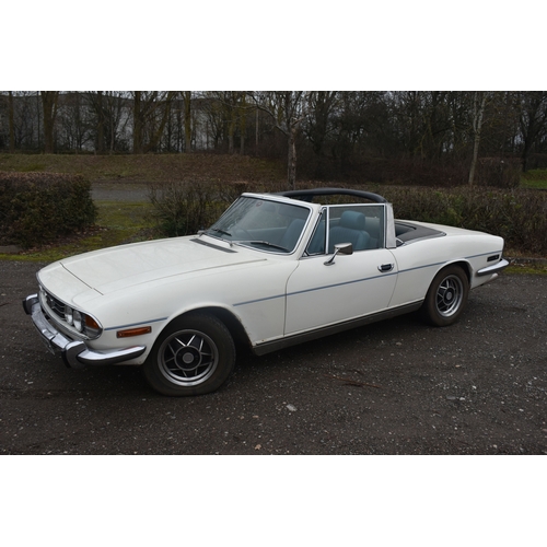 1000 - A 1974 TRIUMPH STAG CONVERTIBLE, REGISTRATION NUMBER JOJ 949N, finished in white with blue trim, tri... 