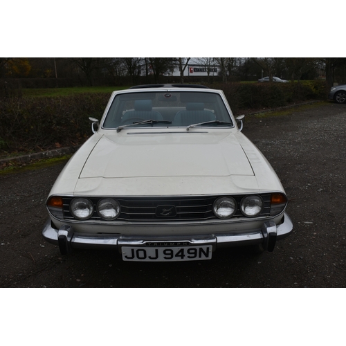 1000 - A 1974 TRIUMPH STAG CONVERTIBLE, REGISTRATION NUMBER JOJ 949N, finished in white with blue trim, tri... 