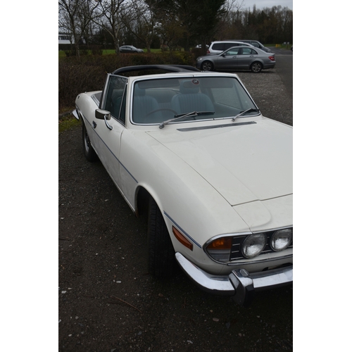 1000 - A 1974 TRIUMPH STAG CONVERTIBLE, REGISTRATION NUMBER JOJ 949N, finished in white with blue trim, tri... 