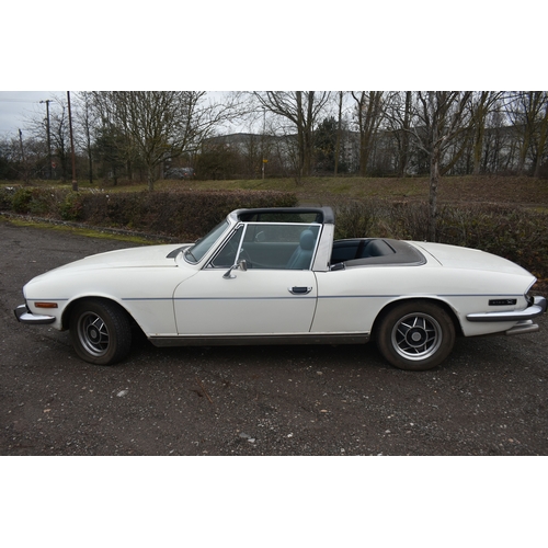 1000 - A 1974 TRIUMPH STAG CONVERTIBLE, REGISTRATION NUMBER JOJ 949N, finished in white with blue trim, tri... 