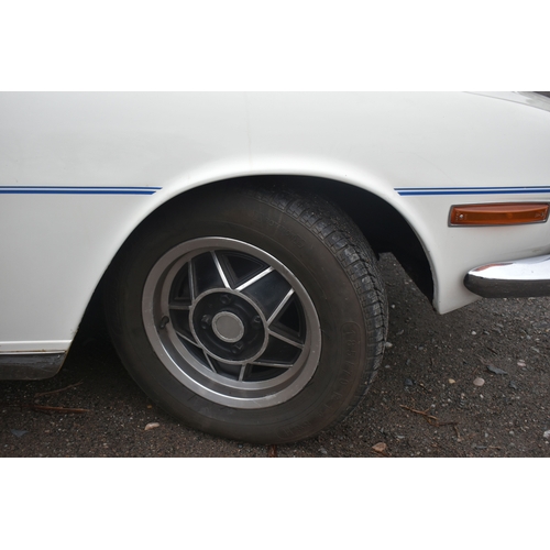 1000 - A 1974 TRIUMPH STAG CONVERTIBLE, REGISTRATION NUMBER JOJ 949N, finished in white with blue trim, tri... 