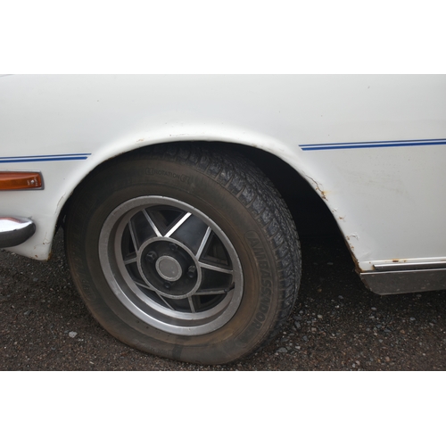 1000 - A 1974 TRIUMPH STAG CONVERTIBLE, REGISTRATION NUMBER JOJ 949N, finished in white with blue trim, tri... 