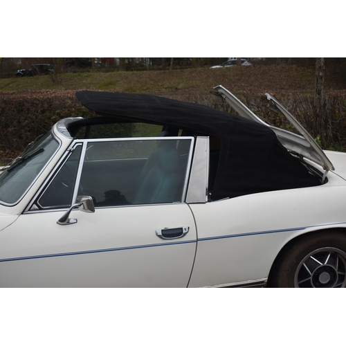 1000 - A 1974 TRIUMPH STAG CONVERTIBLE, REGISTRATION NUMBER JOJ 949N, finished in white with blue trim, tri... 