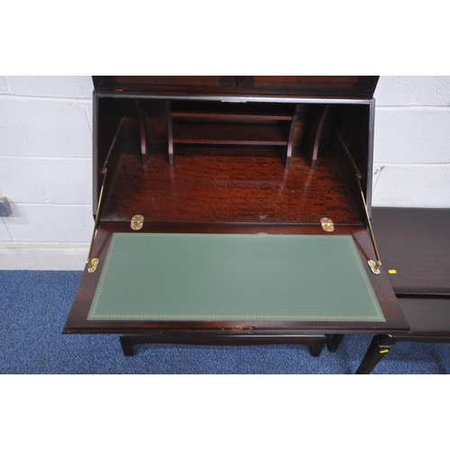 1204 - A STAG MINSTREL BUREAU BOOKCASE, the top with two glazed doors, enclosing two adjustable shelves, th... 