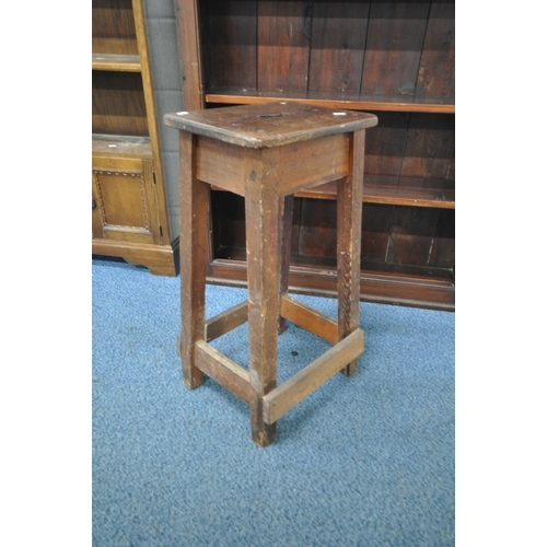 1211 - A 20TH CENTURY OAK BOOKCASE, with a single adjustable shelf, above two doors, width 84cm x depth 26c... 