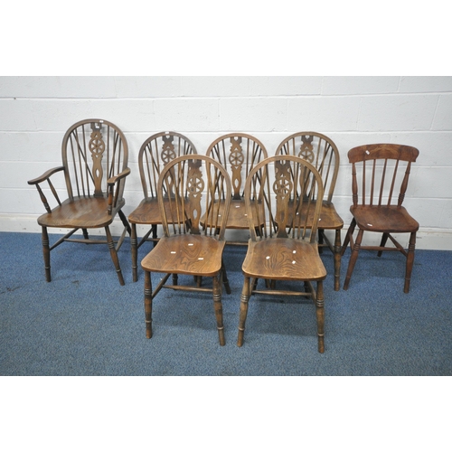 1212 - A SET OF SIX ELM SEATED WHEEL BACK CHAIRS, including one carver, along with another chair (condition... 