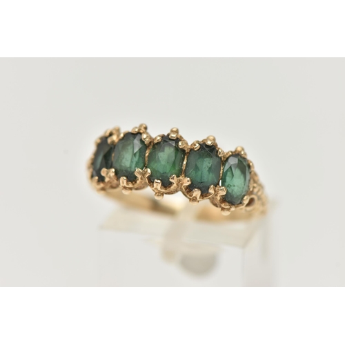 14 - A 9CT GOLD FIVE STONE RING, set with five oval cut green tourmaline, each claw set, applied bead wor... 