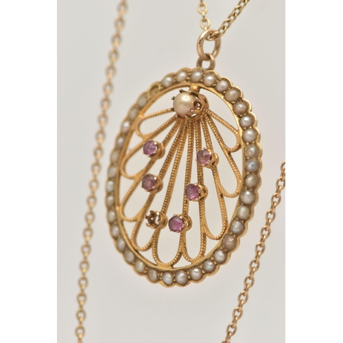 24 - A YELLOW METAL RUBY AND SEED PEARL LAVALIER PENDANT AND CHAIN, oval open work pendant, set with five... 