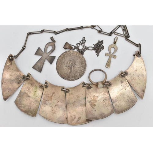 36 - A SMALL ASSORTMENT OF WHITE METAL EGYPTIAN STYLE JEWELLERY, to include a collar style necklace with ... 