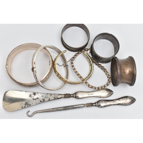 39 - SILVER BANGLES, NAPKIN RINGS AND OTHER ITEMS, to include a silver wide hinged floral bangle, push bu... 