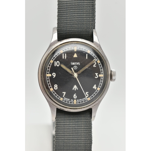 7 - A SMITHS BRITISH MILITARY WRISTWATCH, the matt black dial, with Military arrow, circled T, white Ara... 