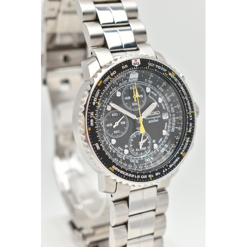 8 - A SEIKO FIGHTMASTER ALARM CHRONOGRAPH WRISTWATCH, the black dial, with illuminous infill hourly appl... 