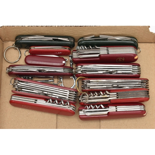 51 - TWELVE ASSORTED POCKET KNIVES, to include a Victorinox Swiss Army knife, seven other multi tool Swis... 