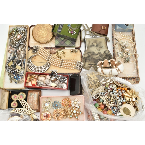 53 - A SELECTION OF COSTUME JEWELLERY, to include an early 20th century rolled gold locket with floral de... 