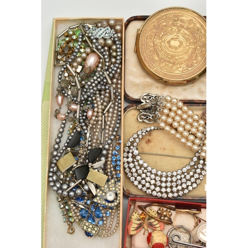 53 - A SELECTION OF COSTUME JEWELLERY, to include an early 20th century rolled gold locket with floral de... 