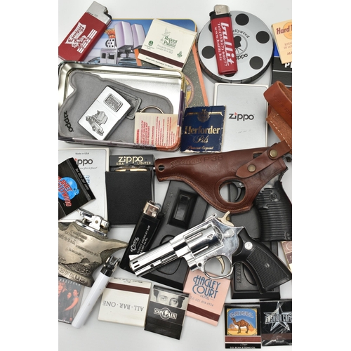 57 - ASSORTED LIGHTERS AND MATCHSTICKS, to include a P38 Western lighter with stand, a 44 Magnum lighter ... 