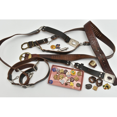 59 - A SELECTION OF MAINLY METAL GIRL GUIDE BADGES AND LEATHER GIRL GUIDE BELTS ETC., badges include Butl... 