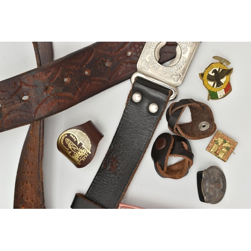 59 - A SELECTION OF MAINLY METAL GIRL GUIDE BADGES AND LEATHER GIRL GUIDE BELTS ETC., badges include Butl... 