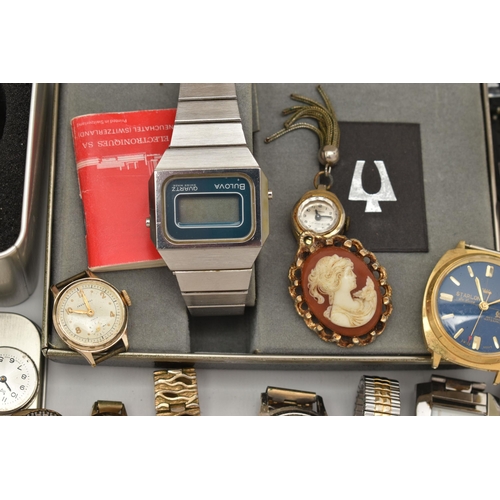 62 - A SELECTION OF WATCHES, to include a Bulova digital LCD quartz wristwatch with fitted box and bookle... 