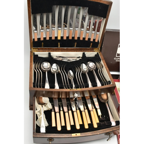 73 - A CANTEEN OF EPNS CUTLERY AND FURTHER CUTLERY AND MATS, the wooden canteen with hinged lid and drawe... 