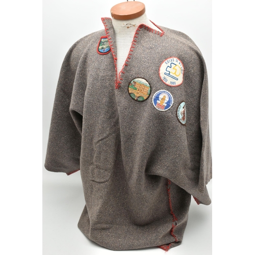 84 - THREE BLANKET PONCHOS WITH MAINLY GIRL GUIDE AND SCOUT BADGES, including two Kandersteg Internationa... 