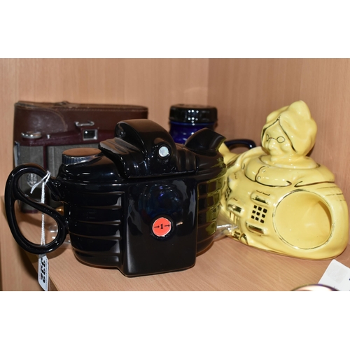 332 - THREE NOVELTY TEAPOTS AND TWO CAMERAS, the teapots comprising a Swinseside Teapottery Kodok (sic) Br... 