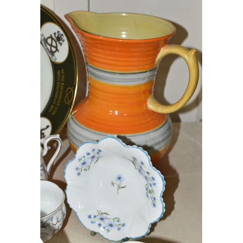 391 - A COLLECTION OF CERAMICS, to include a large orange and grey Shelley jug, height 23cm, a Royal Doult... 