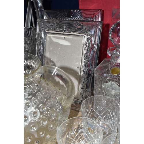 402 - A QUANTITY OF CUT CRYSTAL GLASSWARE, comprising a boxed Stuart Crystal 'Starburst' bottle stopper, a... 