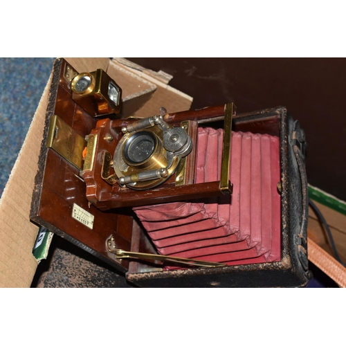 410 - ONE BOX OF VINTAGE CAMERAS AND EQUIPMENT, to include a brown leather case containing a Monroe No6 fo... 